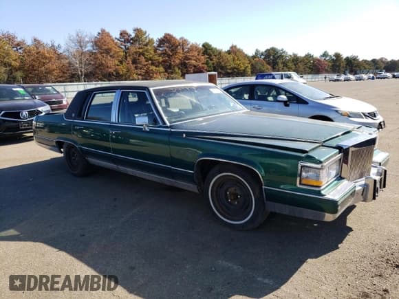 ✅ 1992 Cadillac Brougham • VIN: 1G6DW547XNR703499 • Лот: 66709103. Опубликован ранее на Copart с пробегом Не указан. Бесплатный доступ к архиву аукционных продаж из США и подробный отчёт об истории автомобиля на DreamBid. Изображение 4.