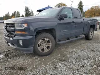 ✅ 2017 Chevrolet Silverado 1500 LT • VIN: 1GCVKREC5HZ197844 • Лот: 82593425. Опубликован ранее на Copart с пробегом 242 321 миль. Бесплатный доступ к архиву аукционных продаж из США и подробный отчёт об истории автомобиля на DreamBid. Изображение 1.