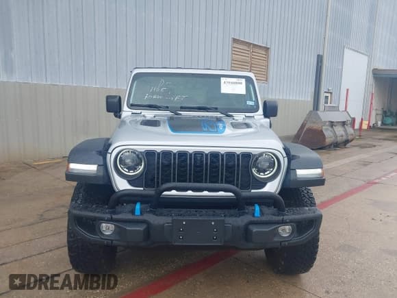 ✅ 2023 Jeep Wrangler Rubicon • VIN: 1C4JJXR63PW696801 • Lot: 43040800. Listed on IAAI with 2,699 mi. Free auction sales archive from the USA and detailed vehicle history report at DreamBid. Image 12.