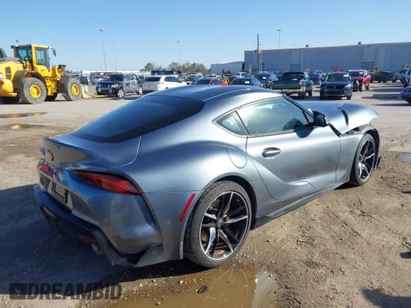 ✅ 2021 Toyota Supra 3.0 • VIN: WZ1DB0C0XMW045457 • Лот: 41706284. Опубликован ранее на IAAI с пробегом 23 573 миль. Бесплатный доступ к архиву аукционных продаж из США и подробный отчёт об истории автомобиля на DreamBid. Изображение 4.