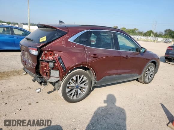 ✅ 2021 Ford Escape Titanium Hybrid • VIN: 1FMCU9DZ7MUA95231 • Lot: 84911015. Listed on Copart with 44,928 mi. Free auction sales archive from the USA and detailed vehicle history report at DreamBid. Image 3.