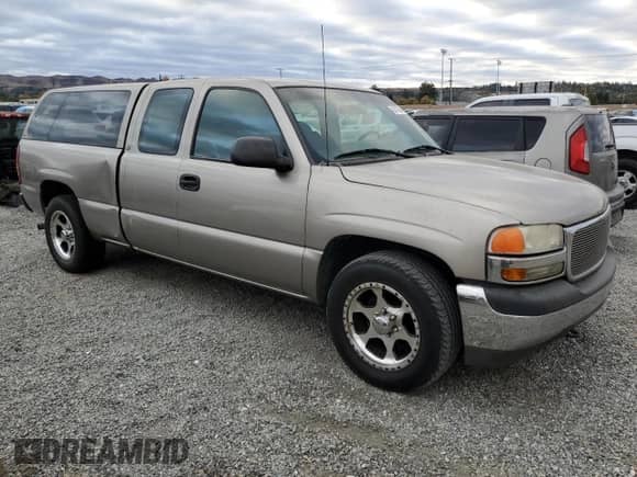 2001 GMC Sierra 1500 SLE1 with VIN 1GTEC19V41Z321666, listed as a Copart auction lot 82470244 with 220,830 mi miles and Clean title. Bid and sale history available at DreamBid. Image 4.