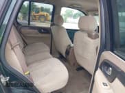 ✅ 2004 GMC Envoy SLE • VIN: 1GKDS13S242374316 • Lot: 42422803. Listed on IAAI with 220,071 mi. Free auction sales archive from the USA and detailed vehicle history report at DreamBid. Image 8.