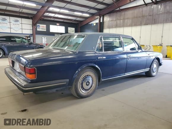 ✅ 1991 Rolls-Royce Silver Spur • VIN: SCAZN02D3MCX34989 • Lot: 71627665. Listed on Copart with 89,681 mi. Free auction sales archive from the USA and detailed vehicle history report at DreamBid. Image 3.