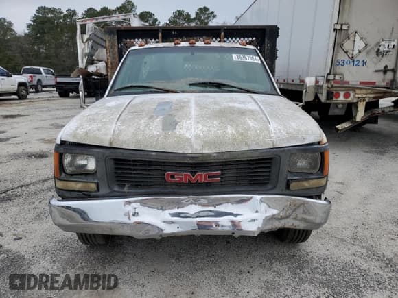 ✅ 1999 GMC Sierra 1500 • VIN: 1GDJC34R3XF087014 • Lot: 86367084. Wystawiony na Copart z przebiegiem 94 539 mil. Bezpłatny archiwum sprzedaży aukcyjnych z USA i szczegółowy raport historii pojazdu na DreamBid. Zdjęcie 5.