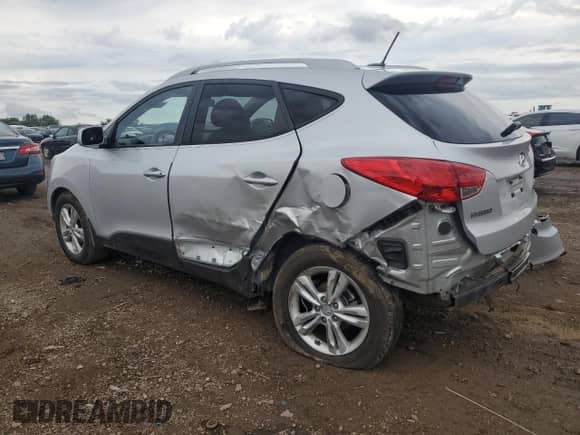 2011 Hyundai Tucson GLS z VIN KM8JU3AC7BU284852, wystawiony jako Copart lot #69496824 z przebiegiem 155 411 mil mil oraz Szkoda całkowita • Salvage title. Historia ofert i sprzedaży dostępna na DreamBid. Obrazek 2.