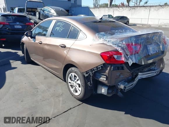 ✅ 2019 Chevrolet Cruze LS • VIN: 1G1BC5SMXK7126656 • Lot: 43546090. Listed on IAAI with 87,531 mi. Free auction sales archive from the USA and detailed vehicle history report at DreamBid. Image 3.
