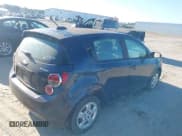 ✅ 2015 Chevrolet Sonic LS • VIN: 1G1JA6SH3F4134194 • Lot: 43132145. Listed on IAAI with 125,722 mi. Free auction sales archive from the USA and detailed vehicle history report at DreamBid. Image 4.