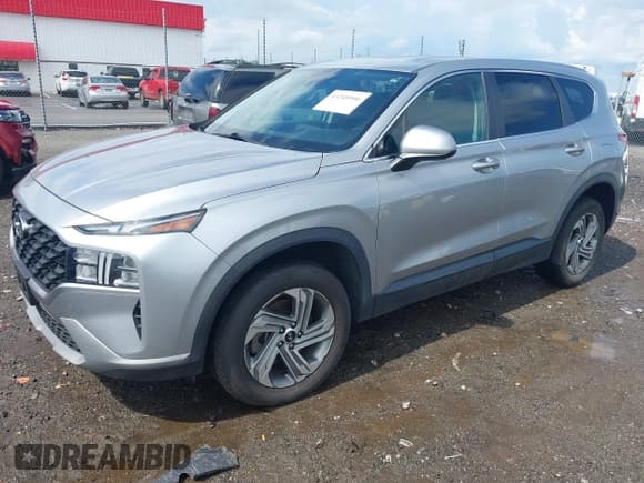 ✅ 2021 Hyundai Santa Fe SE • VIN: 5NMS1DAJ5MH329724 • Lot: 43245906. Listed on IAAI with 67,954 mi. Free auction sales archive from the USA and detailed vehicle history report at DreamBid. Image 2.