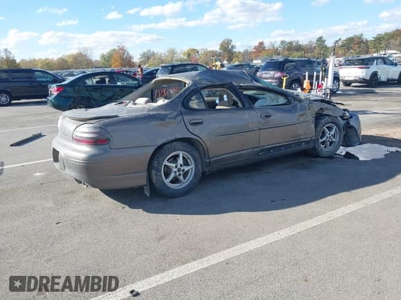 ✅ 2002 Pontiac Grand Prix GT • VIN: 1G2WP52K32F290174 • Lot: 43552971. Wystawiony na IAAI z przebiegiem 113 713 mil. Bezpłatny archiwum sprzedaży aukcyjnych z USA i szczegółowy raport historii pojazdu na DreamBid. Zdjęcie 4.