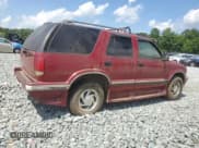 ✅ 1996 Chevrolet Blazer • VIN: 1GNDT13W1T2111686 • Lot: 64119395. Wystawiony na Copart z przebiegiem 138 596 mil. Bezpłatny archiwum sprzedaży aukcyjnych z USA i szczegółowy raport historii pojazdu na DreamBid. Zdjęcie 3.