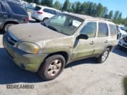 ✅ 2001 Mazda Tribute LX • VIN: 4F2CU08111KM29927 • Лот: 42750632. Опубликован ранее на IAAI с пробегом 206 174 миль. Бесплатный доступ к архиву аукционных продаж из США и подробный отчёт об истории автомобиля на DreamBid. Изображение 2.
