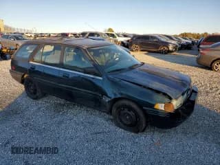 ✅ 1995 Ford Escort • VIN: 3FASP15J2SR187228 • Лот: 88762945. Опубликован ранее на Copart с пробегом 159 058 миль. Бесплатный доступ к архиву аукционных продаж из США и подробный отчёт об истории автомобиля на DreamBid. Изображение 4.