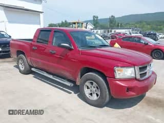 ✅ 2008 Dodge Dakota SLT • VIN: 1D7HW48N88S515990 • Lot: 42899327. Wystawiony na IAAI z przebiegiem 145 255 mil mil. Skorzystaj z bezpłatnego archiwum sprzedaży aukcyjnych z USA i zobacz szczegółowy raport historii pojazdu na DreamBid. Zdjęcie 1.