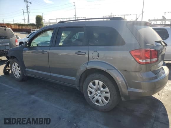✅ 2013 Dodge Journey SE • VIN: 3C4PDCAB8DT711877 • Lot: 70142965. Listed on Copart with 134,337 mi. Free auction sales archive from the USA and detailed vehicle history report at DreamBid. Image 2.
