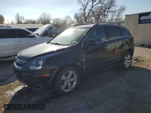 2015 Chevrolet Captiva Sport LT z VIN 3GNAL3EK4FS511548, wystawiony jako Copart lot #84188124 z przebiegiem 275 071 mil mil oraz Czysty tytuł • Clean title. Historia ofert i sprzedaży dostępna na DreamBid. Obrazek 1.