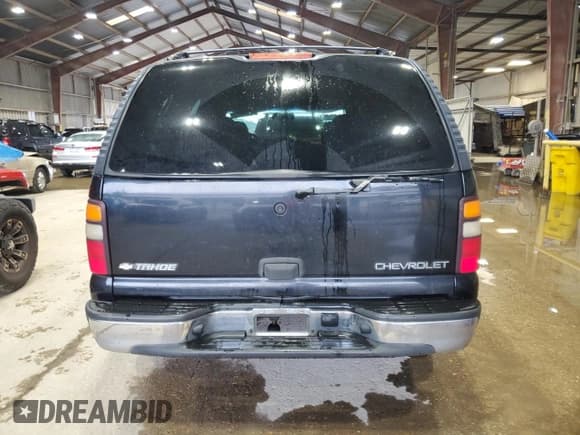 ✅ 2004 Chevrolet Tahoe LS • VIN: 1GNEC13V44R113162 • Lot: 56244545. Listed on Copart with 255,264 mi. Free auction sales archive from the USA and detailed vehicle history report at DreamBid. Image 6.