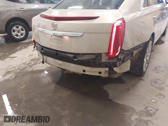 ✅ 2015 Cadillac XTS Luxury • VIN: 2G61N5S35F9220679 • Лот: 41487320. Опубликован ранее на IAAI с пробегом 133 308 миль. Бесплатный доступ к архиву аукционных продаж из США и подробный отчёт об истории автомобиля на DreamBid. Изображение 18.