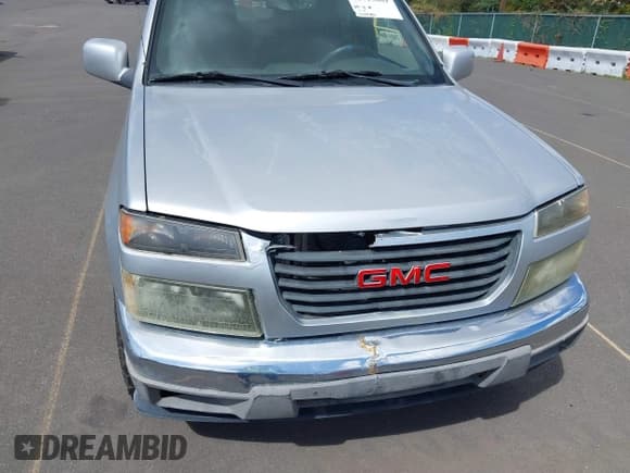 ✅ 2010 GMC Canyon SLE1 • VIN: 1GTJTCDE3A8118842 • Лот: 41713069. Опубликован ранее на IAAI с пробегом 132 583 миль. Бесплатный доступ к архиву аукционных продаж из США и подробный отчёт об истории автомобиля на DreamBid. Изображение 6.