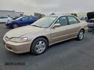 ✅ 2000 Honda Accord EX • VIN: 1HGCG1650YA067450 • Lot: 95983475. Listed on Copart with 150,780 mi. Free auction sales archive from the USA and detailed vehicle history report at DreamBid. Image 1.