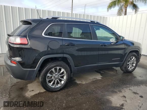 ✅ 2020 Jeep Cherokee Lux • VIN: 1C4PJMLX0LD640671 • Lot: 51362365. Listed on Copart with 144,819 mi. Free auction sales archive from the USA and detailed vehicle history report at DreamBid. Image 3.