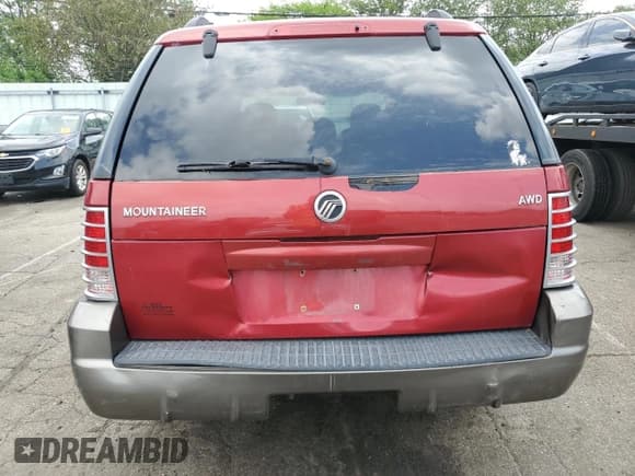 ✅ 2004 Mercury Mountaineer Convenience • VIN: 4M2ZU86KX4UJ06323 • Lot: 61662835. Listed on Copart with 186,014 mi. Free auction sales archive from the USA and detailed vehicle history report at DreamBid. Image 6.