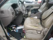 ✅ 2000 Nissan Quest GXE • VIN: 4N2XN11T5YD803774 • Lot: 49010365. Listed on Copart with 121,764 mi. Free auction sales archive from the USA and detailed vehicle history report at DreamBid. Image 7.