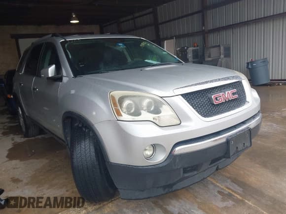 ✅ 2011 GMC Acadia SLT1 • VIN: 1GKKRRED4BJ417752 • Lot: 43782423. Listed on IAAI with 256,394 mi. Free auction sales archive from the USA and detailed vehicle history report at DreamBid. Image 1.
