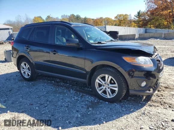 ✅ 2011 Hyundai Santa Fe SE • VIN: 5XYZHDAG5BG014279 • Lot: 87061945. Listed on Copart with 118,406 mi. Free auction sales archive from the USA and detailed vehicle history report at DreamBid. Image 4.