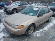 ✅ 1998 Ford Escort LX • VIN: 1FAFP10P4WW212534 • Лот: 43844363. Опубликован ранее на IAAI с пробегом 133 006 миль. Бесплатный доступ к архиву аукционных продаж из США и подробный отчёт об истории автомобиля на DreamBid. Изображение 2.