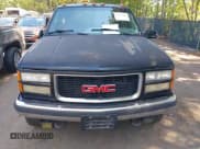 ✅ 1995 GMC Suburban • VIN: 1GKGK26N9SJ707428 • Lot: 43123104. Listed on IAAI with 328,915 mi. Free auction sales archive from the USA and detailed vehicle history report at DreamBid. Image 6.