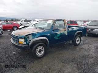 1993 Dodge Dakota z VIN 1B7GG26X3PS277833, wystawiony jako IAAI lot #41634223 z przebiegiem 100 092 mil mil oraz . Historia ofert i sprzedaży dostępna na DreamBid. Obrazek 2.