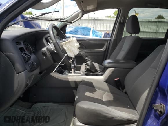 ✅ 2005 Mazda Tribute i • VIN: 4F2YZ92Z35KM23983 • Lot: 68100295. Wystawiony na Copart z przebiegiem 162 787 mil. Bezpłatny archiwum sprzedaży aukcyjnych z USA i szczegółowy raport historii pojazdu na DreamBid. Zdjęcie 7.