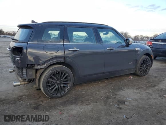 ✅ 2018 MINI Clubman Cooper S • VIN: WMWLU5C56J2G03014 • Lot: 79804564. Listed on Copart with 66,899 mi. Free auction sales archive from the USA and detailed vehicle history report at DreamBid. Image 3.