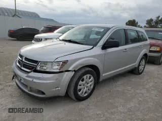 ✅ 2014 Dodge Journey American Value • VIN: 3C4PDCAB8ET201997 • Lot: 85731035. Listed on Copart with 103,802 mi. Free auction sales archive from the USA and detailed vehicle history report at DreamBid. Image 1.