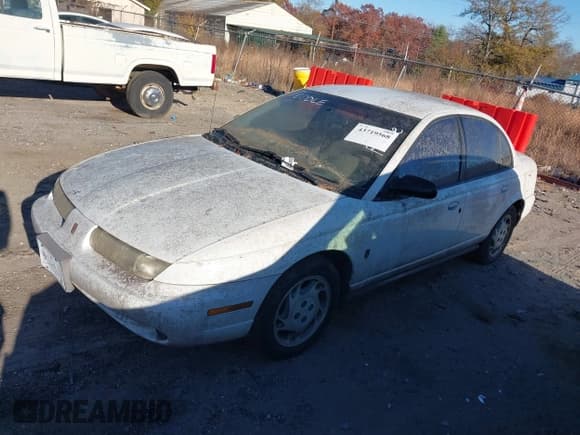 ✅ 1996 Saturn SL • VIN: 1G8ZK527XTZ254110 • Lot: 43719568. Listed on IAAI with 196,706 mi. Free auction sales archive from the USA and detailed vehicle history report at DreamBid. Image 2.
