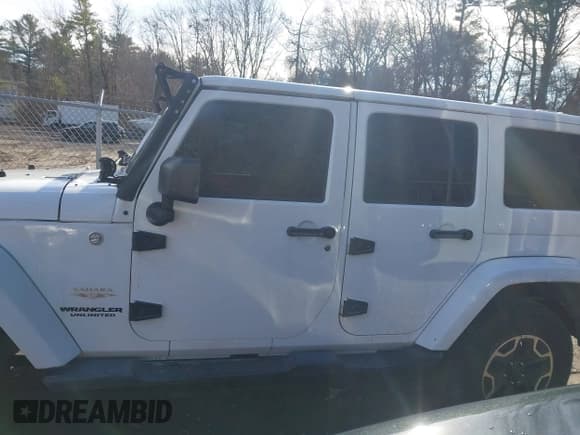 ✅ 2013 Jeep Wrangler Unlimited Sahara • VIN: 1C4BJWEG9DL509006 • Lot: 43802917. Listed on IAAI with 142,933 mi. Free auction sales archive from the USA and detailed vehicle history report at DreamBid. Image 14.