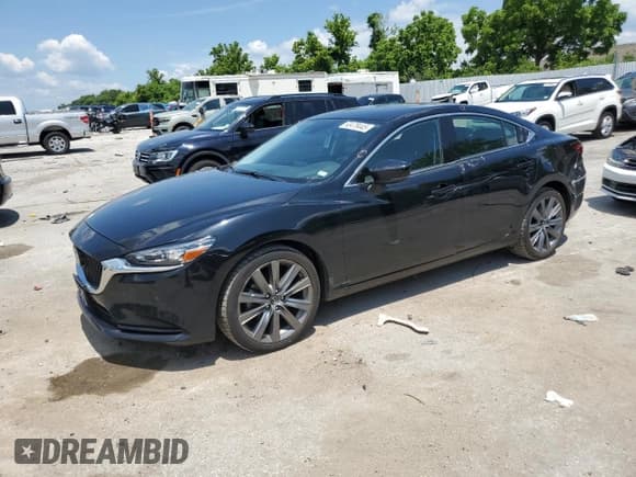 ✅ 2021 Mazda 6 Touring • VIN: JM1GL1VM3M1612829 • Лот: 63479445. Опубликован ранее на Copart с пробегом 66 601 миль. Бесплатный доступ к архиву аукционных продаж из США и подробный отчёт об истории автомобиля на DreamBid. Изображение 1.