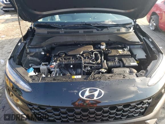 ✅ 2022 Hyundai Kona SE • VIN: KM8K22AB6NU762923 • Лот: 68256214. Опубликован ранее на Copart с пробегом 25 053 миль. Бесплатный доступ к архиву аукционных продаж из США и подробный отчёт об истории автомобиля на DreamBid. Изображение 11.