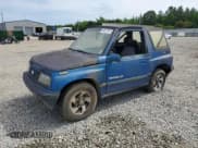 ✅ 1993 Geo Tracker • VIN: 2CNBJ18UXP6921660 • Лот: 58027275. Опубликован ранее на Copart с пробегом 64 349 миль. Бесплатный доступ к архиву аукционных продаж из США и подробный отчёт об истории автомобиля на DreamBid. Изображение 1.