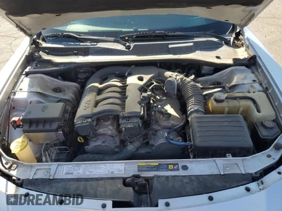 2006 Dodge Charger с VIN 2B3KA43G06H390223, выставлен на аукционе Copart как лот 77042244 с пробегом 174 786 миль миль и На запчасти • Non repairable. История ставок и продаж доступна на DreamBid. Изображение 11.