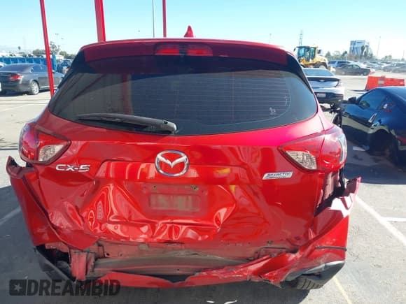 ✅ 2015 Mazda CX-5 Sport • VIN: JM3KE2BE6F0500131 • Lot: 43784489. Listed on IAAI with 149,701 mi. Free auction sales archive from the USA and detailed vehicle history report at DreamBid. Image 16.