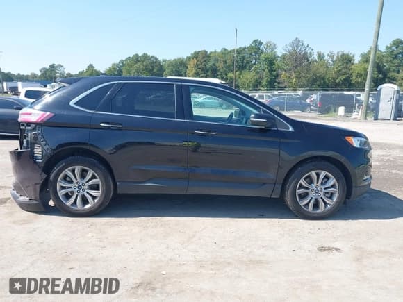 ✅ 2022 Ford Edge Titanium • VIN: 2FMPK4K98NBA94951 • Lot: 43255197. Wystawiony na IAAI z przebiegiem 70 473 mil. Bezpłatny archiwum sprzedaży aukcyjnych z USA i szczegółowy raport historii pojazdu na DreamBid. Zdjęcie 13.