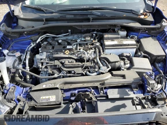 ✅ 2023 Toyota Corolla Cross LE • VIN: 7MUBAABGXPV079020 • Lot: 89714185. Wystawiony na Copart z przebiegiem 25 257 mil. Bezpłatny archiwum sprzedaży aukcyjnych z USA i szczegółowy raport historii pojazdu na DreamBid. Zdjęcie 12.