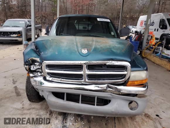 1998 Dodge Dakota SLT z VIN 1B7GL22Y9WS688713, wystawiony jako Copart lot #44952955 z przebiegiem 106 102 mil mil oraz Szkoda całkowita • Salvage title. Historia ofert i sprzedaży dostępna na DreamBid. Obrazek 5.