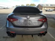 ✅ 2021 Alfa Romeo Giulia Quadrifoglio • VIN: ZARFAMEV5M7646074 • Lot: 46932545. Wystawiony na Copart z przebiegiem 21 797 mil. Bezpłatny archiwum sprzedaży aukcyjnych z USA i szczegółowy raport historii pojazdu na DreamBid. Zdjęcie 6.
