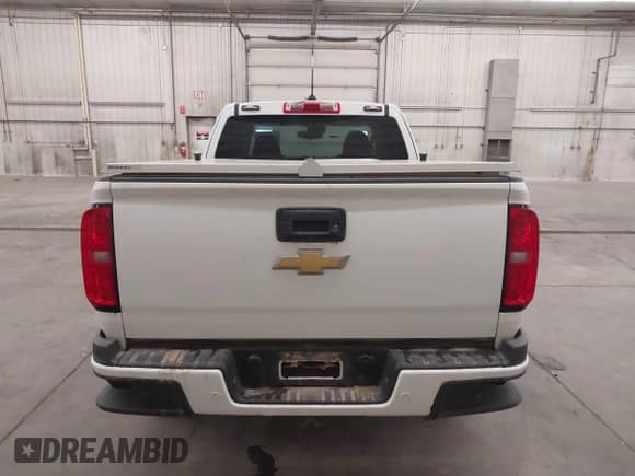 2020 Chevrolet Colorado 4WD LT z VIN 1GCHTCEA3L1160482, wystawiony jako IAAI lot #41720575 z przebiegiem 96 062 mil mil oraz . Historia ofert i sprzedaży dostępna na DreamBid. Obrazek 17.