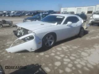 ✅ 2013 Dodge Challenger SXT • VIN: 2C3CDYAG1DH607753 • Lot: 44423165. Wystawiony na Copart z przebiegiem 130 210 mil. Bezpłatny archiwum sprzedaży aukcyjnych z USA i szczegółowy raport historii pojazdu na DreamBid. Zdjęcie 1.