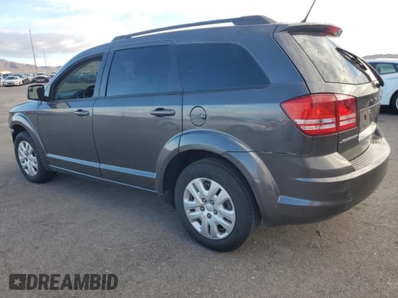 ✅ 2016 Dodge Journey SE • VIN: 3C4PDCAB0GT240358 • Lot: 86099105. Listed on Copart with 201,276 mi. Free auction sales archive from the USA and detailed vehicle history report at DreamBid. Image 2.