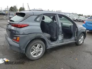✅ 2020 Hyundai Kona SE • VIN: KM8K1CAA2LU500085 • Лот: 71814774. Опубликован ранее на Copart с пробегом 104 455 миль. Бесплатный доступ к архиву аукционных продаж из США и подробный отчёт об истории автомобиля на DreamBid. Изображение 3.